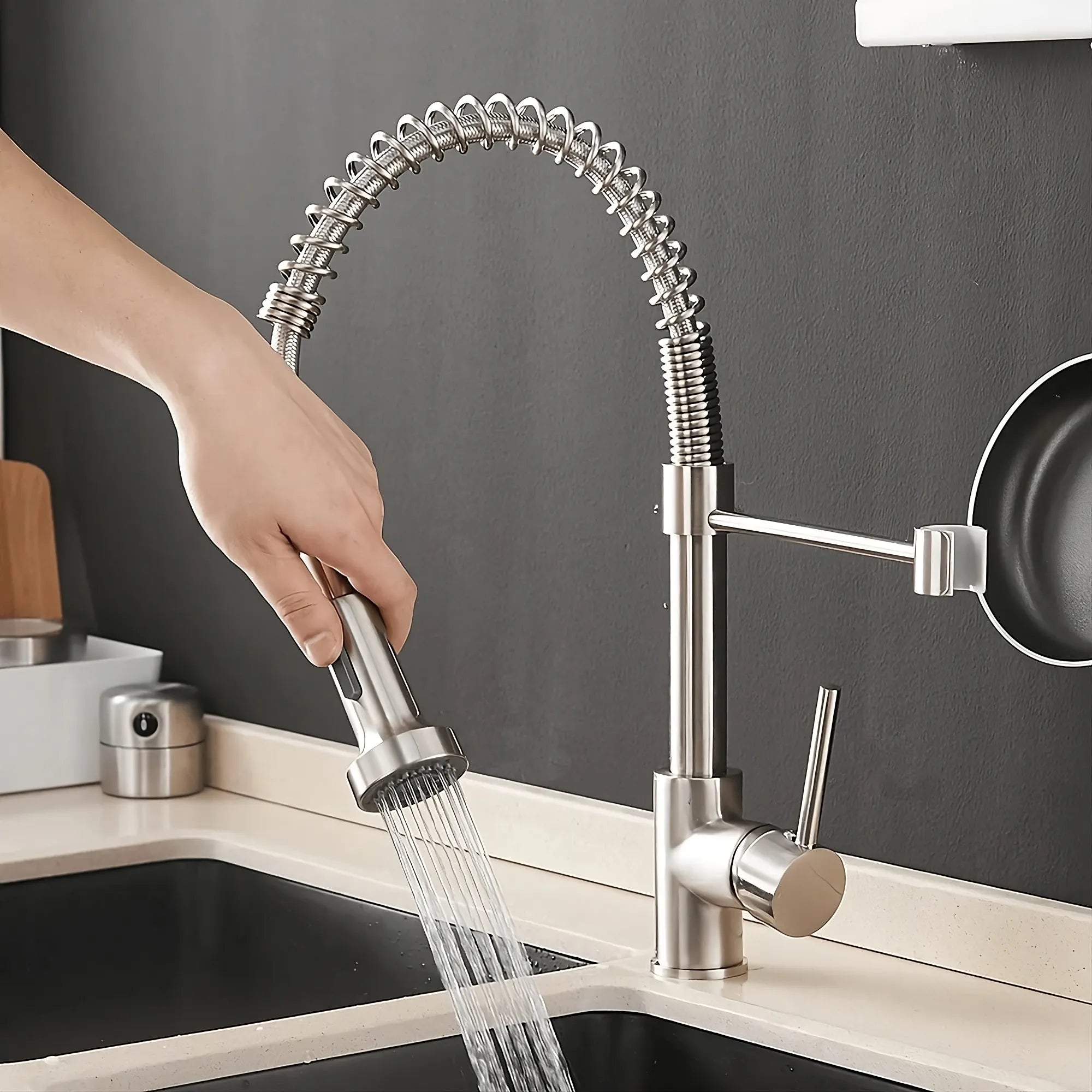 Using Halmstad pull-out kitchen faucet and spinning it