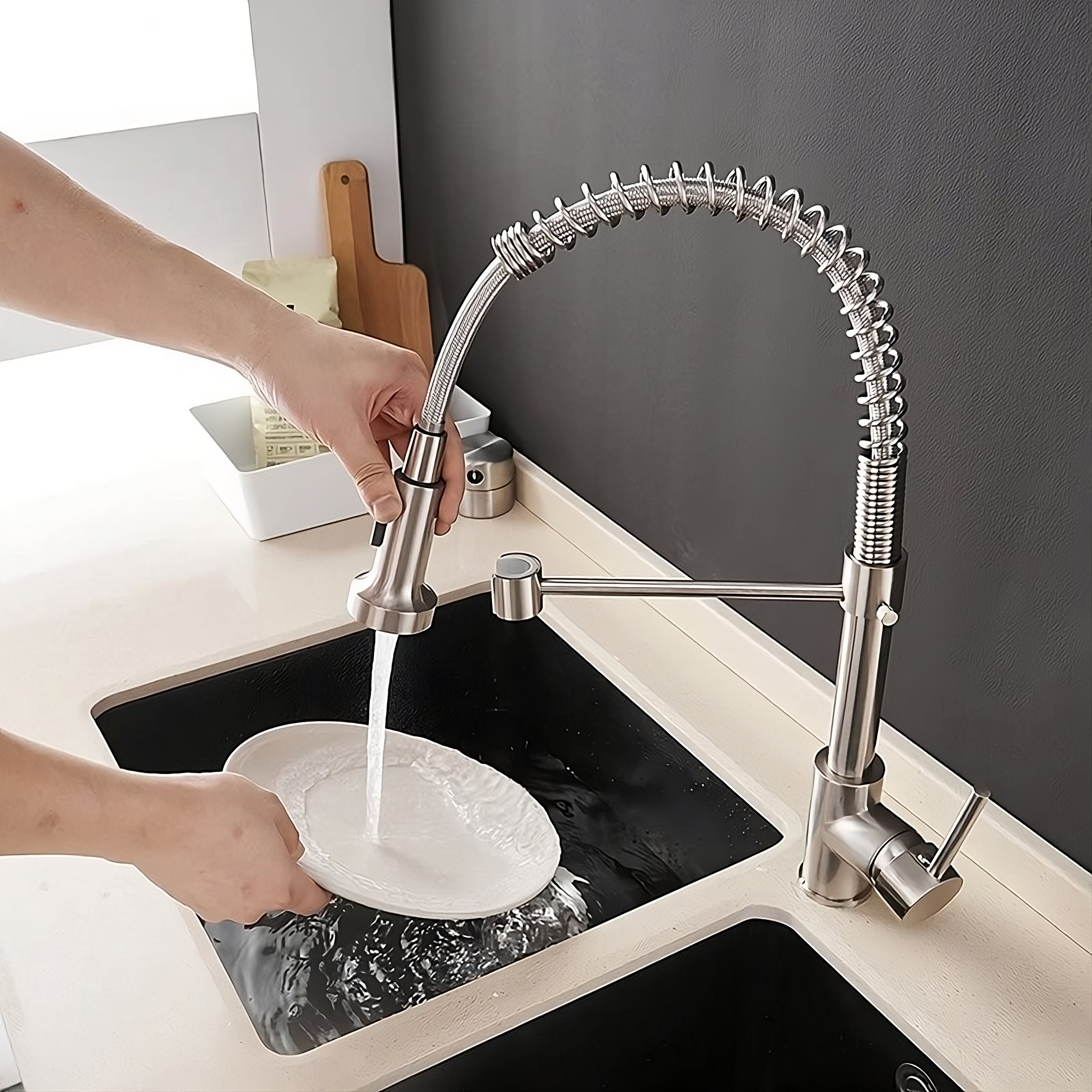 Using Halmstad pull-out kitchen faucet for washing dishes