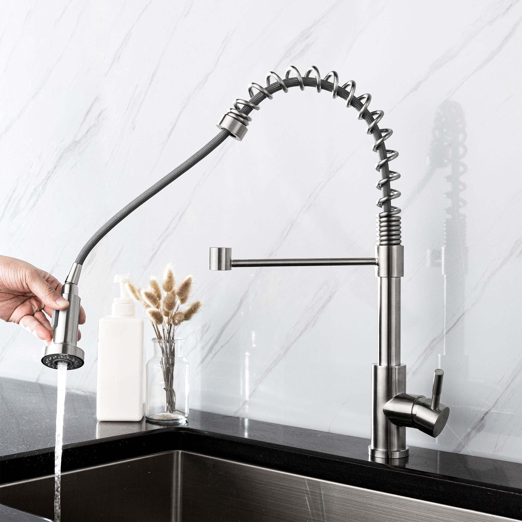 Brushed nickel professional kitchen faucet with pull-out spout from a spring