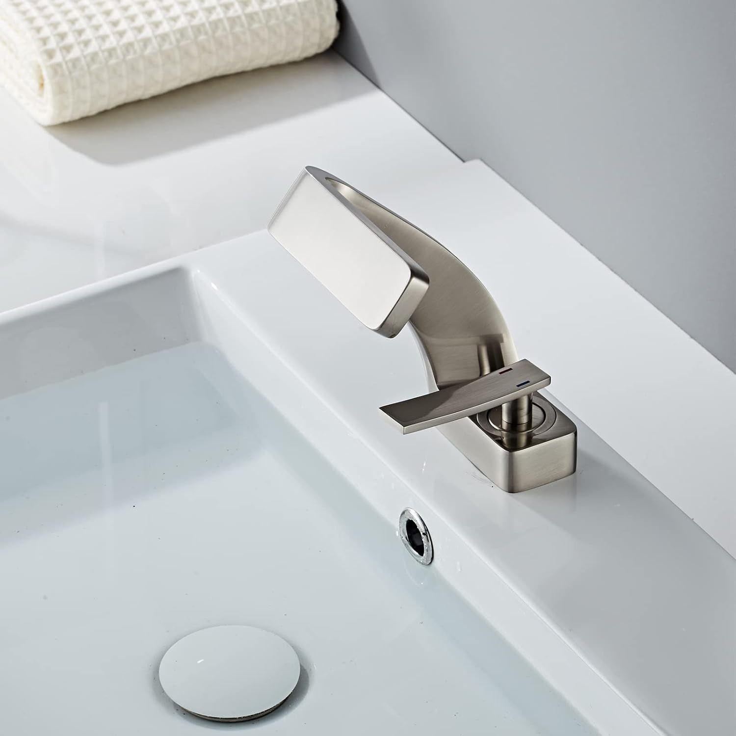 Brushed nickel modern bathroom faucet with minimalistic style