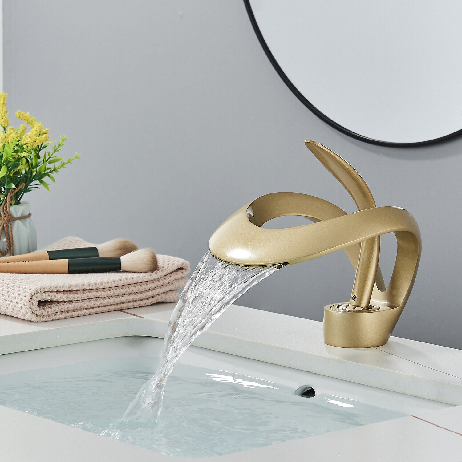 Golden luxury bathroom waterfall faucet