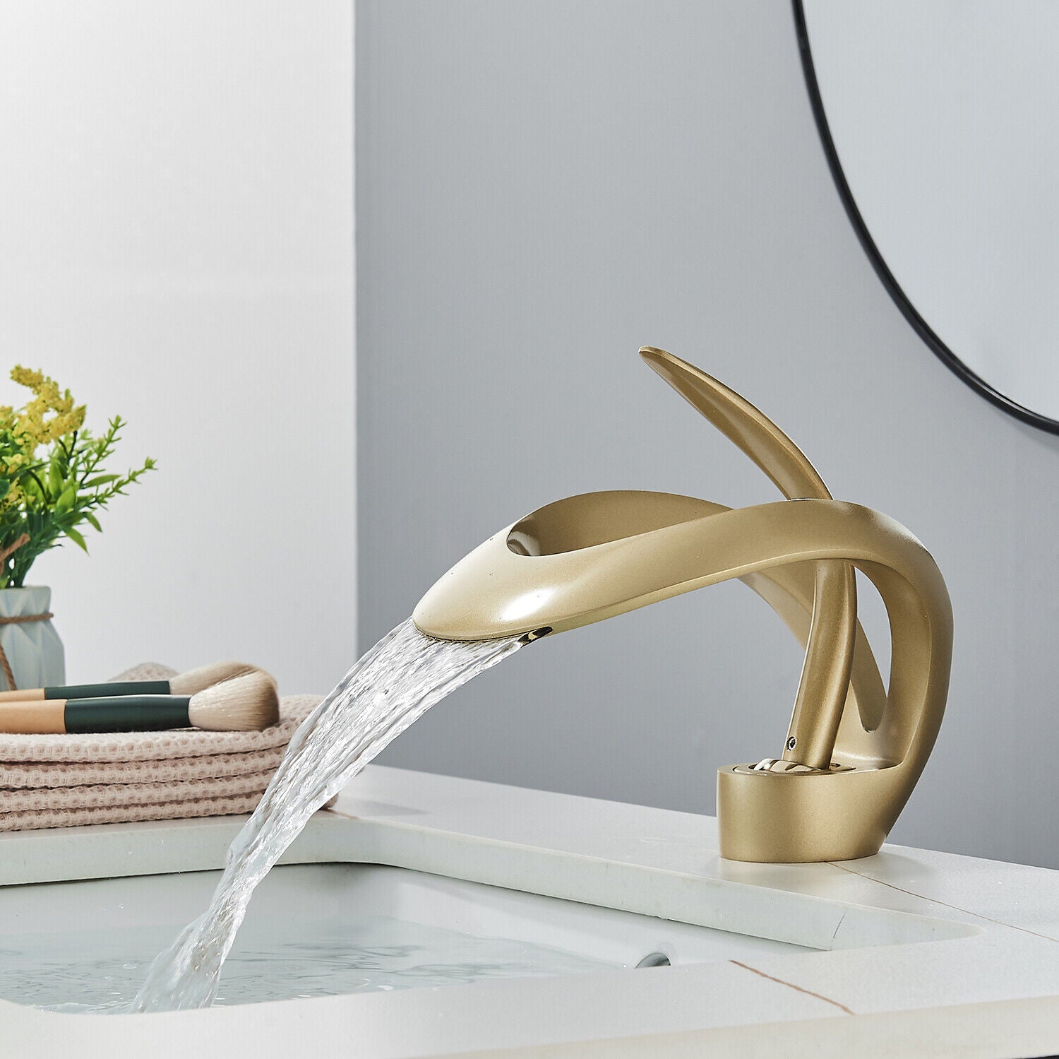 Golden luxury bathroom waterfall faucet