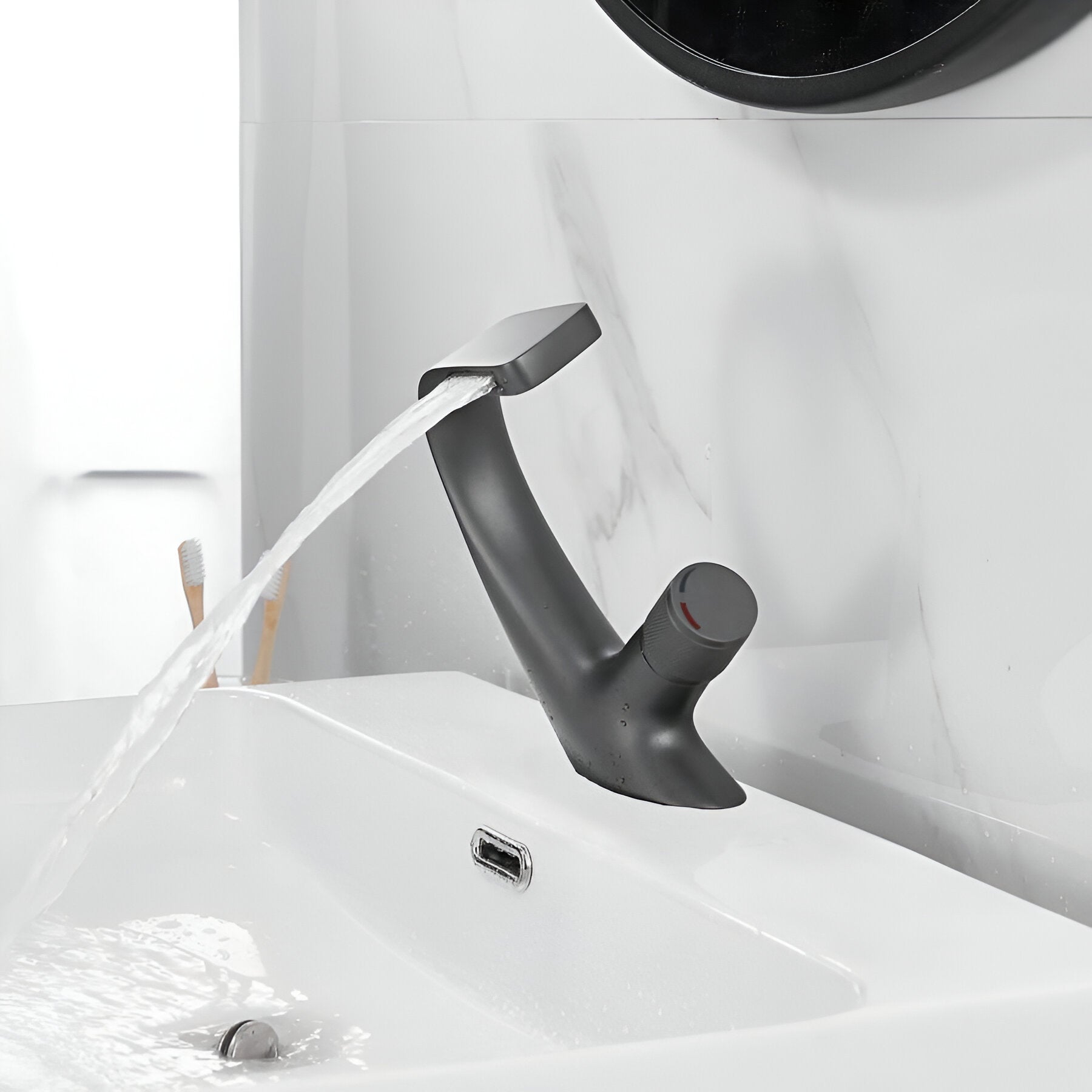 Gray luxury bathroom faucet that pours water in front