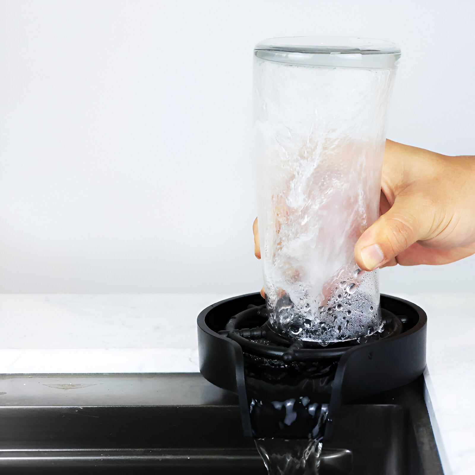 Countertop glass rinser in use